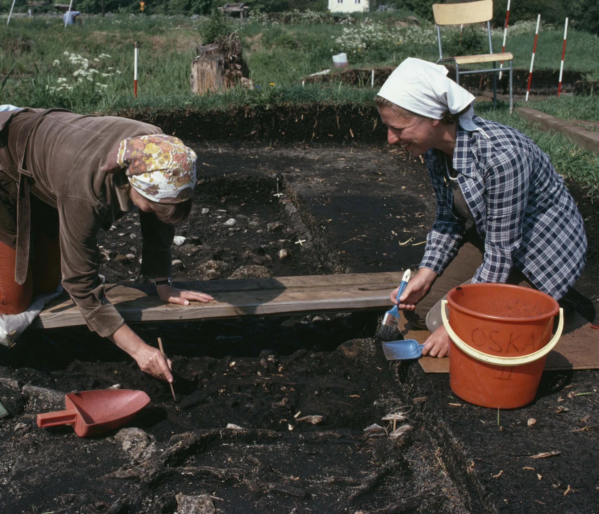 Two women digging