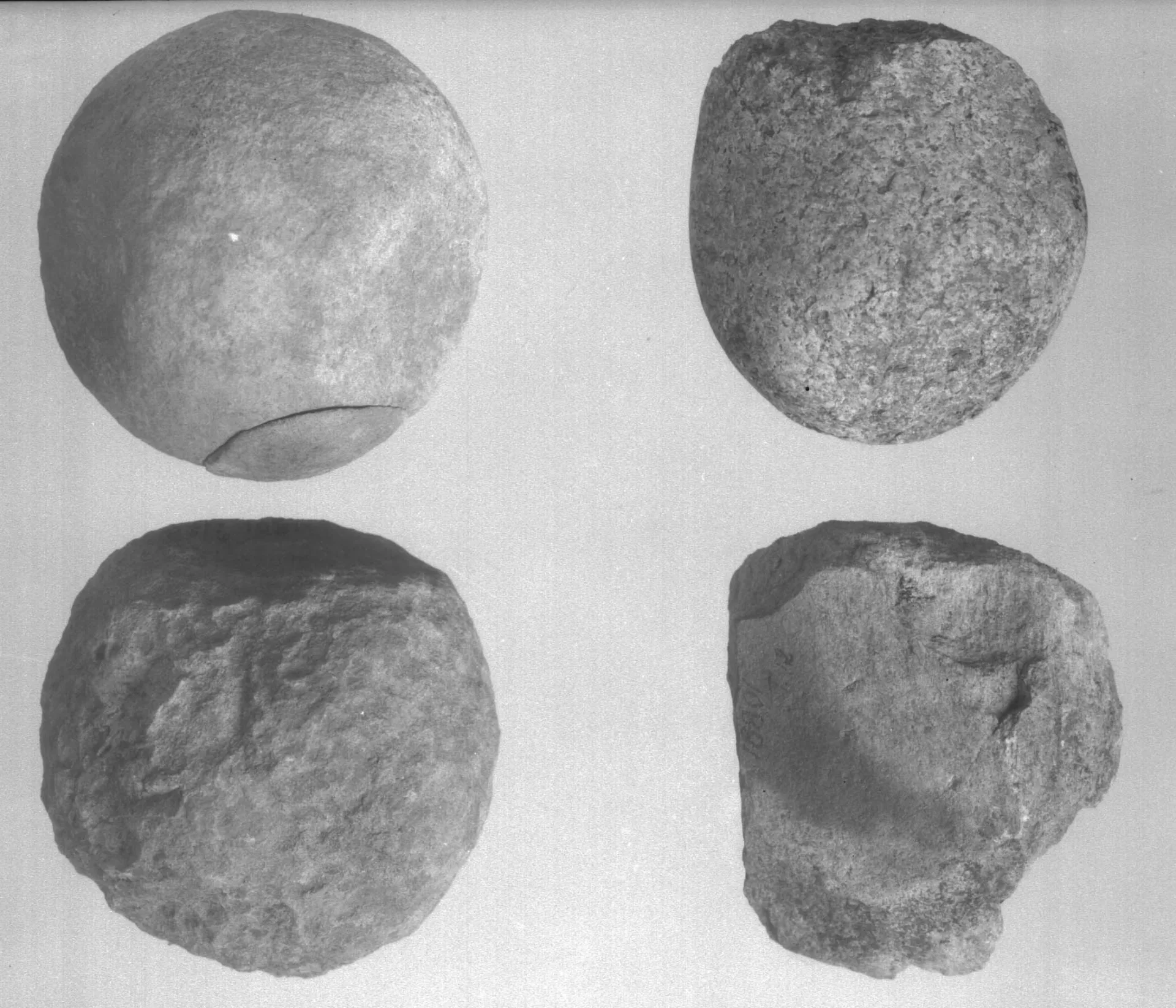 Four stone artefacts from an excavation