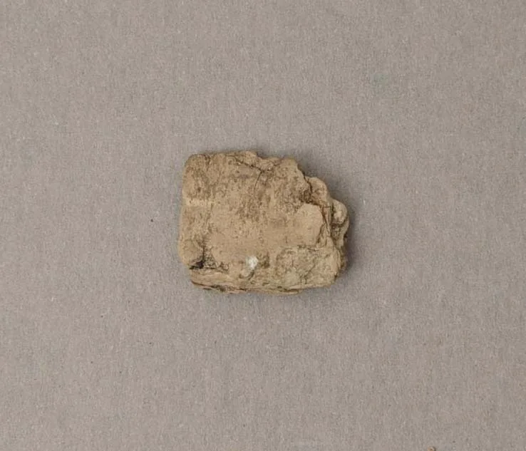 Piece of clay artefact
