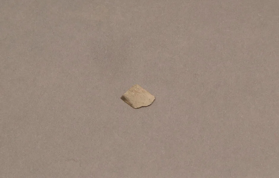 Square shaped flint axe with polished surface