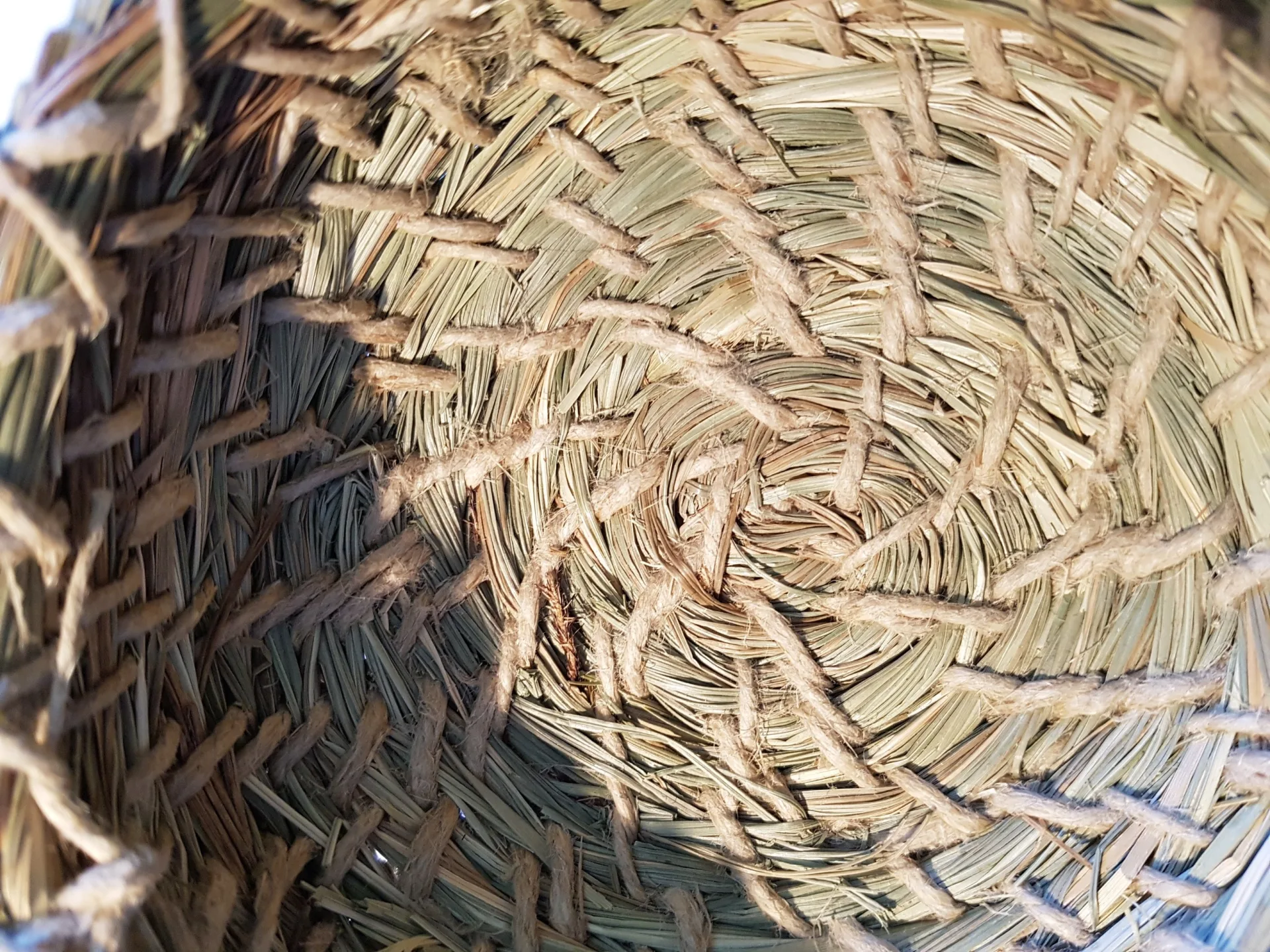 The bottom of a newly made basked for comparison